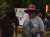 Volunteers looking  at student created display boards